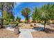 A nicely landscaped community park with mature trees, seating, and walkways at 3429 Glacial Lake St, Las Vegas, NV 89122