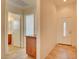 Bright entryway featuring tile flooring, a cabinet, and a front door with decorative glass at 3429 Glacial Lake St, Las Vegas, NV 89122