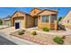 Charming single-story home showcasing xeriscaping, desert landscaping, and an inviting front entrance at 3429 Glacial Lake St, Las Vegas, NV 89122