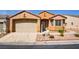 Inviting single-story home boasting a two-car garage and low-maintenance front yard at 3429 Glacial Lake St, Las Vegas, NV 89122