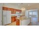 Well-lit kitchen with granite countertops and stainless steel appliances at 3429 Glacial Lake St, Las Vegas, NV 89122