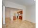 Open-concept living area featuring tile flooring, recessed lighting, and a kitchen view at 3429 Glacial Lake St, Las Vegas, NV 89122