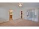Spacious main bedroom with carpet, bright natural light, and access to the main bath at 3429 Glacial Lake St, Las Vegas, NV 89122