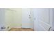Mud room with tile flooring and a wire rack shelf above an alcove for washer and dryer at 3429 Glacial Lake St, Las Vegas, NV 89122