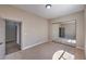 Bedroom with large sliding door closet, neutral-toned walls and carpeted floor at 3693 Miguels Ln, Las Vegas, NV 89120