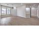 Bright living room with sleek floors, featuring ample windows and modern recessed lighting at 3693 Miguels Ln, Las Vegas, NV 89120