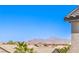 A rooftop view showcases mountains and neighborhood, offering scenic vistas at 3821 Nesting Wren Dr, North Las Vegas, NV 89084