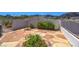 Backyard featuring stone patio, low-maintenance landscaping and privacy fencing at 454 Intrepid Ct, Boulder City, NV 89005