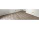 Neutral carpeted bedroom offers a clean and minimalist aesthetic at 454 Intrepid Ct, Boulder City, NV 89005