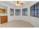 Cozy breakfast nook with a ceiling fan, tiled flooring, and a view of the backyard at 454 Intrepid Ct, Boulder City, NV 89005