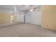 Expansive main bedroom with a ceiling fan, neutral carpet, and an abundance of natural light at 454 Intrepid Ct, Boulder City, NV 89005