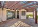 Inviting covered patio with a ceiling fan, perfect for enjoying the outdoors in comfort at 454 Intrepid Ct, Boulder City, NV 89005