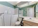 Bathroom with walk-in tub, mirrored wall, wood vanity, and tiled walls at 4724 Victoria Beach Way, Las Vegas, NV 89130
