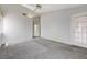 Spacious carpeted bedroom with direct access to the outside and the ensuite bathroom at 4724 Victoria Beach Way, Las Vegas, NV 89130