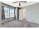 Bedroom with carpet floors, a window for natural light, and a spacious walk-in closet at 4724 Victoria Beach Way, Las Vegas, NV 89130
