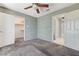 Spacious bedroom features carpet flooring, closet, and ensuite bathroom, offering comfort and convenience at 4724 Victoria Beach Way, Las Vegas, NV 89130