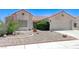 Charming single-story home with desert landscaping and a two-car garage at 4724 Victoria Beach Way, Las Vegas, NV 89130