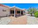 Covered patio with white pergola, offering an inviting space for relaxation and entertaining at 4724 Victoria Beach Way, Las Vegas, NV 89130