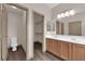 Bathroom with double sink vanity, and separate toilet and walk-in closet at 5001 Morning Falls Ave, Las Vegas, NV 89131