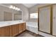 Bathroom with double sink vanity, separate tub and shower with glass door at 5001 Morning Falls Ave, Las Vegas, NV 89131