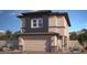 This is a modern two story home with neutral color palette, two car garage, and desert landscaping at 514 Red Lovebird Ave # Lot 1241, Henderson, NV 89011