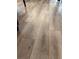 Close-up view of the wood-look laminate flooring at 5414 Enchanted Rose St, Las Vegas, NV 89148