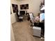 This office includes two desks, chairs, soundproofing tiles and modern computer equipment at 5414 Enchanted Rose St, Las Vegas, NV 89148