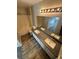 Well-lit bathroom features double sinks, gray countertops, and a tub-shower combination at 5710 E Tropicana Ave # 2225, Las Vegas, NV 89122