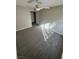 This bedroom features gray carpet, a modern ceiling fan, and is freshly painted at 5710 E Tropicana Ave # 2225, Las Vegas, NV 89122