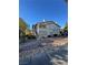 Inviting two-story condo with a charming entrance and well-maintained landscaping at 5710 E Tropicana Ave # 2225, Las Vegas, NV 89122