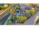 Aerial view showcasing a backyard with pool, spa, covered patio, desert landscaping, and privacy wall at 5805 Cabo San Lucas Ave, Las Vegas, NV 89131