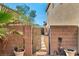 Gated side yard with desert landscaping and walkway at 5805 Cabo San Lucas Ave, Las Vegas, NV 89131