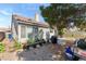 Backyard area featuring gravel, patio, and greenery at 5914 Rose Sage St, North Las Vegas, NV 89031