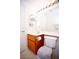 Bright bathroom featuring a vanity, toilet, and a decorative shower curtain at 6249 Halehaven Dr, Las Vegas, NV 89110