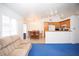 Open-concept layout with a living room, dining area, and kitchen, perfect for entertaining at 6249 Halehaven Dr, Las Vegas, NV 89110