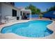 Inviting backyard with a sparkling pool perfect for outdoor entertaining and enjoying sunny days at 6249 Halehaven Dr, Las Vegas, NV 89110