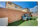 Backyard with artificial grass at 635 Taliput Palm Pl, Henderson, NV 89011