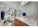 Bathroom with double vanity and shower curtain at 635 Taliput Palm Pl, Henderson, NV 89011