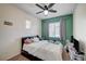 Bedroom featuring neutral paint, carpet and window at 635 Taliput Palm Pl, Henderson, NV 89011