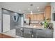 Modern kitchen features granite countertops, stainless steel appliances, and a breakfast bar at 635 Taliput Palm Pl, Henderson, NV 89011