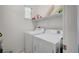 Laundry room with white washer and dryer at 635 Taliput Palm Pl, Henderson, NV 89011