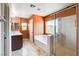 Bathroom featuring a soaking tub, separate shower, double vanity, and ample natural light at 6569 Cedar Waxwing St, North Las Vegas, NV 89084