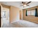 Bedroom with plush carpeting and access to a walk-in closet and other rooms at 6569 Cedar Waxwing St, North Las Vegas, NV 89084