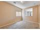 Bright bedroom with neutral carpet and walls at 6569 Cedar Waxwing St, North Las Vegas, NV 89084