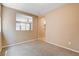 Cozy bedroom with neutral carpet and walls at 6569 Cedar Waxwing St, North Las Vegas, NV 89084