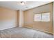 Bedroom with neutral-toned walls, carpet flooring, and a window for natural light at 6569 Cedar Waxwing St, North Las Vegas, NV 89084