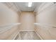 Walk-in closet with carpet and wire shelving, providing ample storage space at 6569 Cedar Waxwing St, North Las Vegas, NV 89084