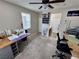 Large bedroom featuring carpet, fan, and natural light at 6614 Collingsworth St, Las Vegas, NV 89131
