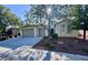 Charming single-story home featuring a three-car garage, a well-maintained yard and mature shade trees at 6614 Collingsworth St, Las Vegas, NV 89131