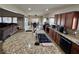 Well-equipped kitchen boasts a large island with granite countertops and stainless steel appliances at 6614 Collingsworth St, Las Vegas, NV 89131